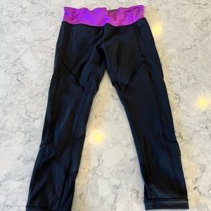 Lululemon running pants luxtreme fabric black with purple waistband. Size 8